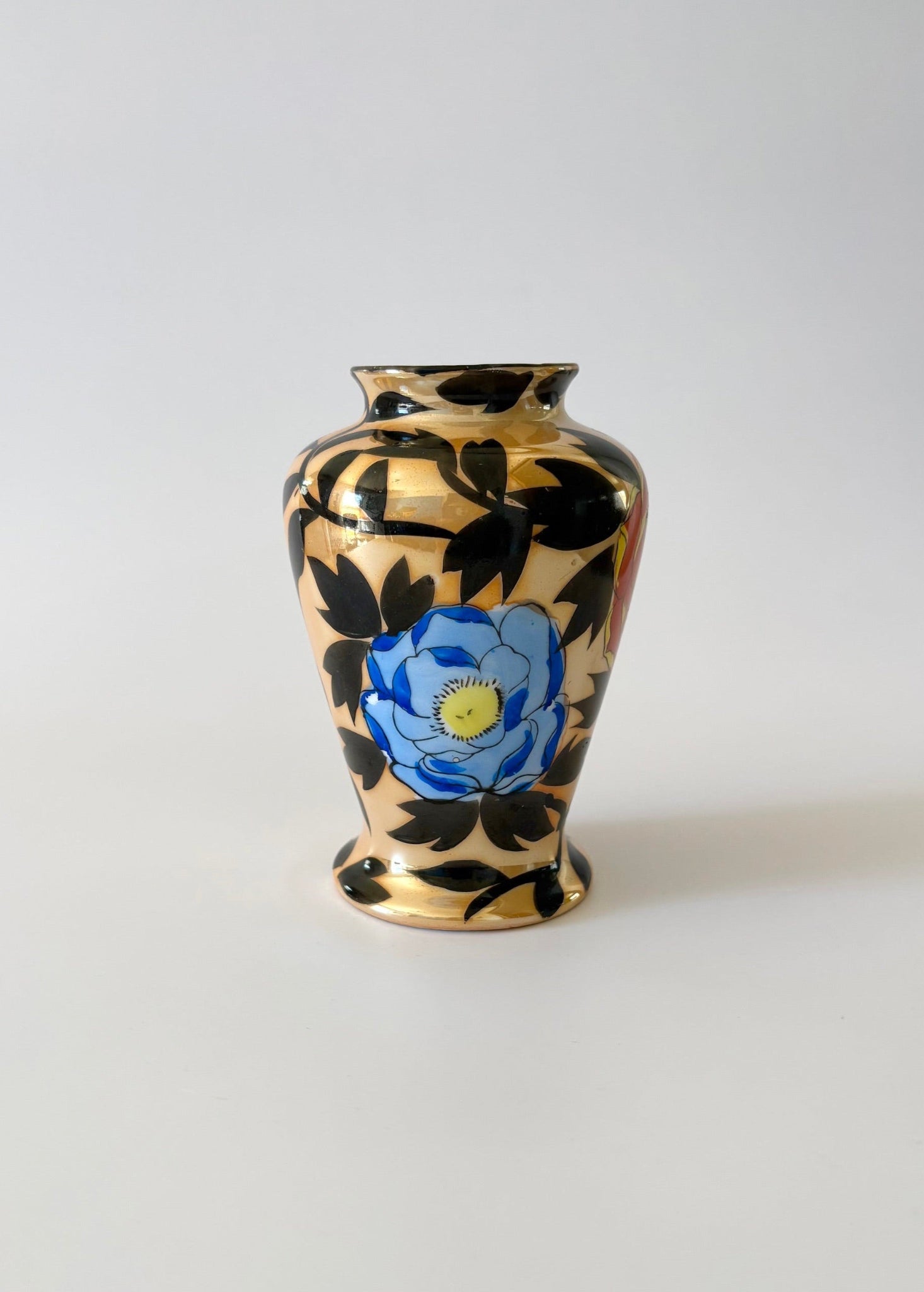 Small Vase with Black Leaves and Flowers