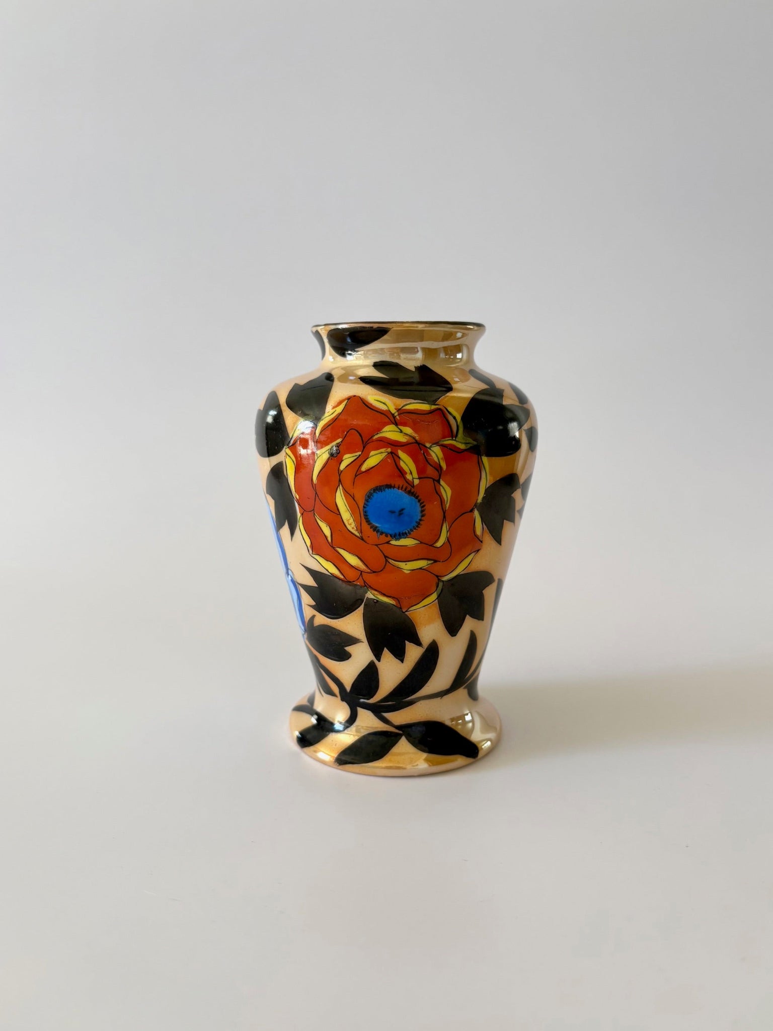 Small Vase with Black Leaves and Flowers