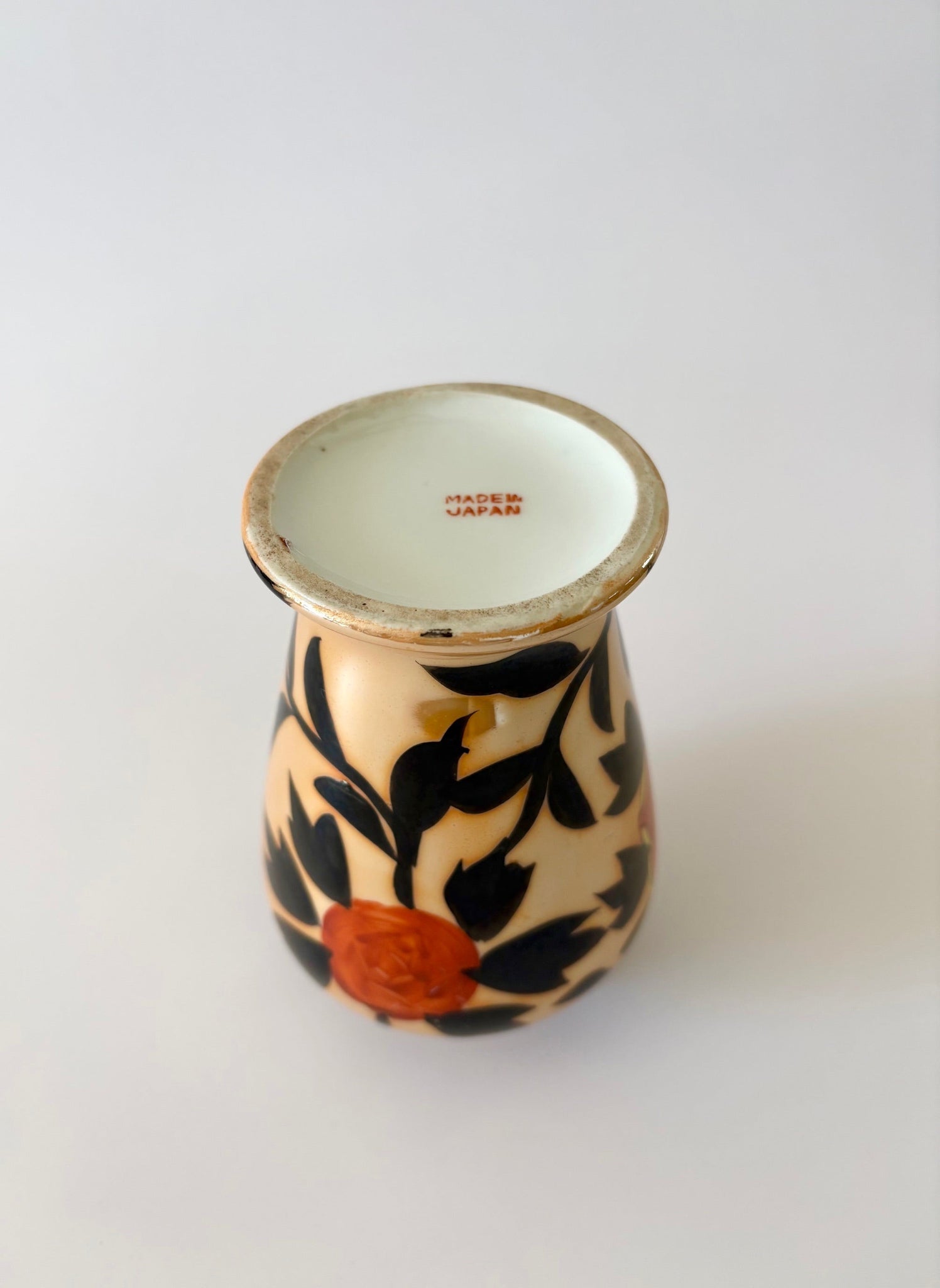 Small Vase with Black Leaves and Flowers