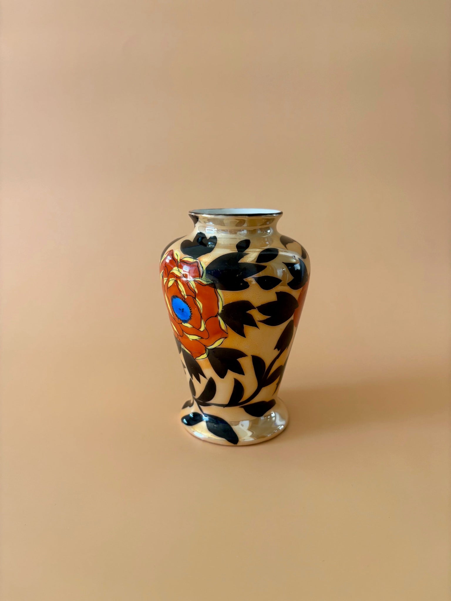 Small Vase with Black Leaves and Flowers