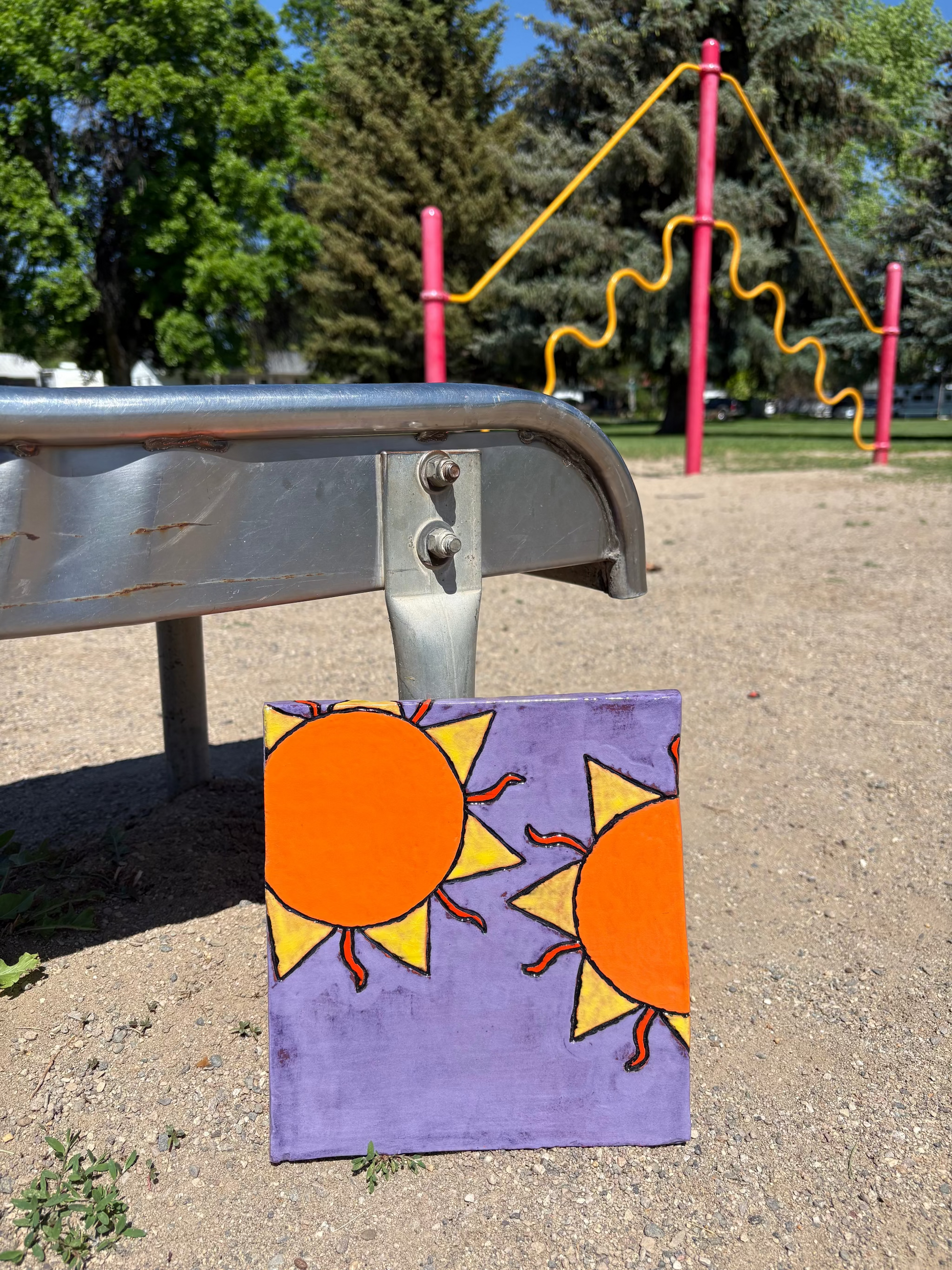 Handmade Tile with Suns