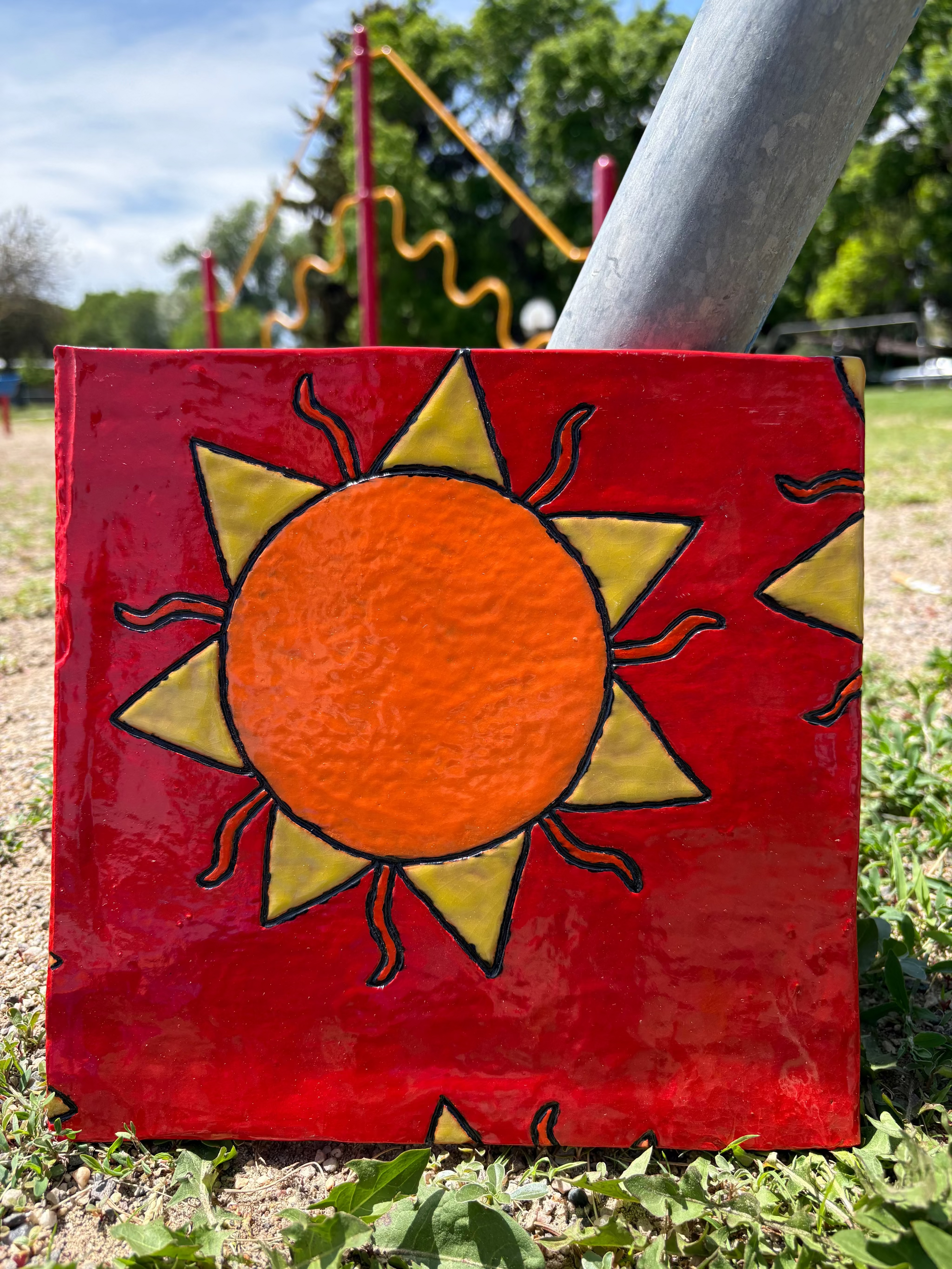 Handmade Tile with Suns